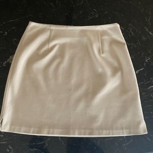 Limited cream colored women’s skirt with side zipper size 4